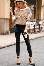 Chevron knit crewneck sweater in camel and white with white cuffs and neckline.