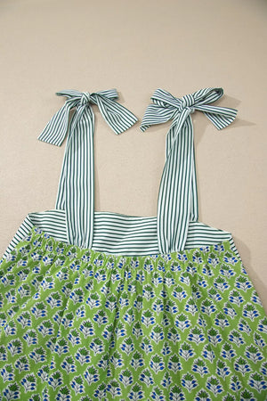 Floral tie-strap tank top with square neckline and green stripe detail.