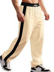 Men's Khaki wide-leg sweatpants with black side stripe and drawstring waist.