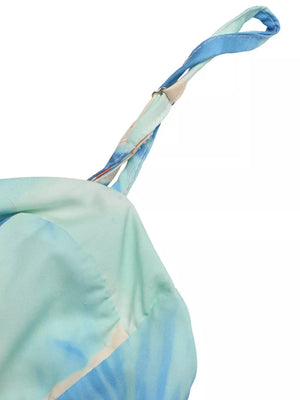 Floral sweetheart midi dress with aqua and blue tie-dye print and spaghetti straps.