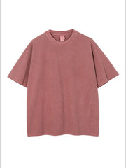 Oversized washed cotton tee in rust with relaxed fit and crewneck.