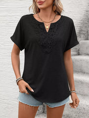 Black relaxed fit t-shirt with lace trim neckline and cuffed short sleeves.