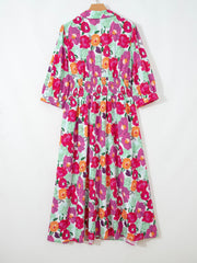 Floral V-neck cotton midi dress with smocked waist and 3/4 sleeves.
