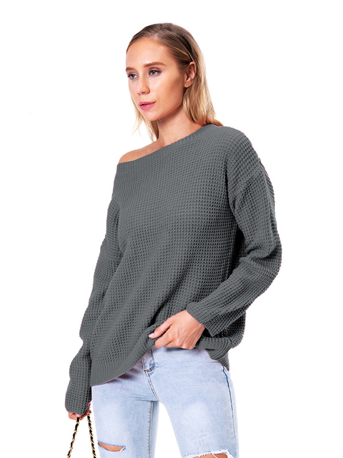 Charcoal waffle knit off-shoulder sweater with long sleeves and a relaxed fit.