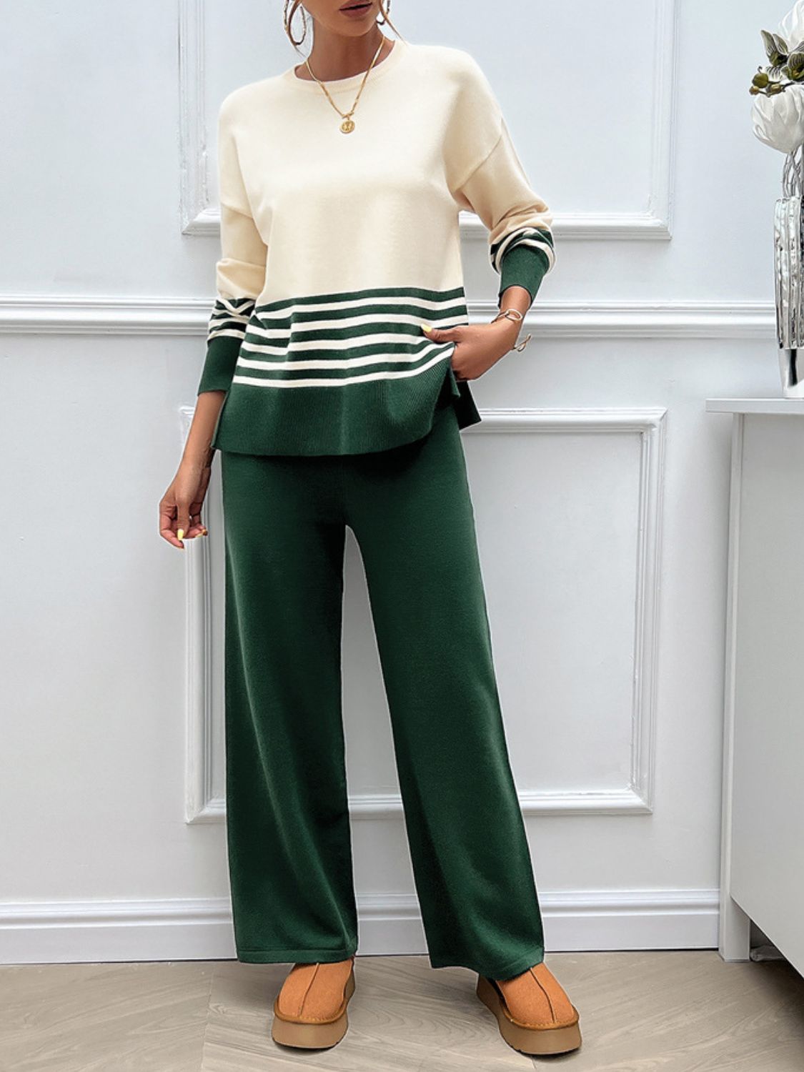 Color-blocked knit lounge set in cream and dark green with horizontal stripes, acrylic material.
