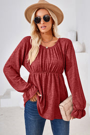 Burgundy peasant blouse with cinched waist and ruffled cuffs, long sleeves, scoop neck