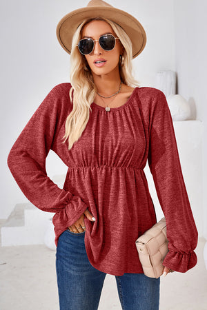 Burgundy peasant blouse with cinched waist and ruffled cuffs, long sleeves, scoop neck