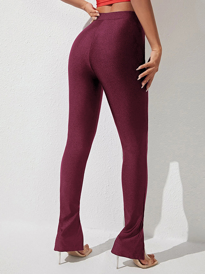 Wine split-hem leggings with center seam and cotton blend fabric.