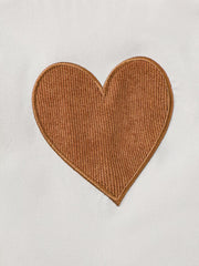 Baby girl outfit with brown corduroy heart applique on white top
