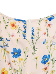 A-line maxi dress with square neckline and a delicate wildflower print.