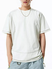 Relaxed fit t-shirt in Coconut Milk White with contrast stitching details and short sleeves.
