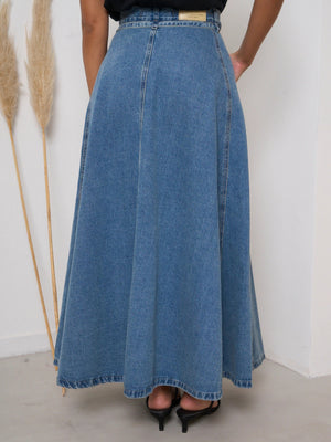 High-waisted A-line denim skirt in Dusty Blue, with a full, flowing cut.