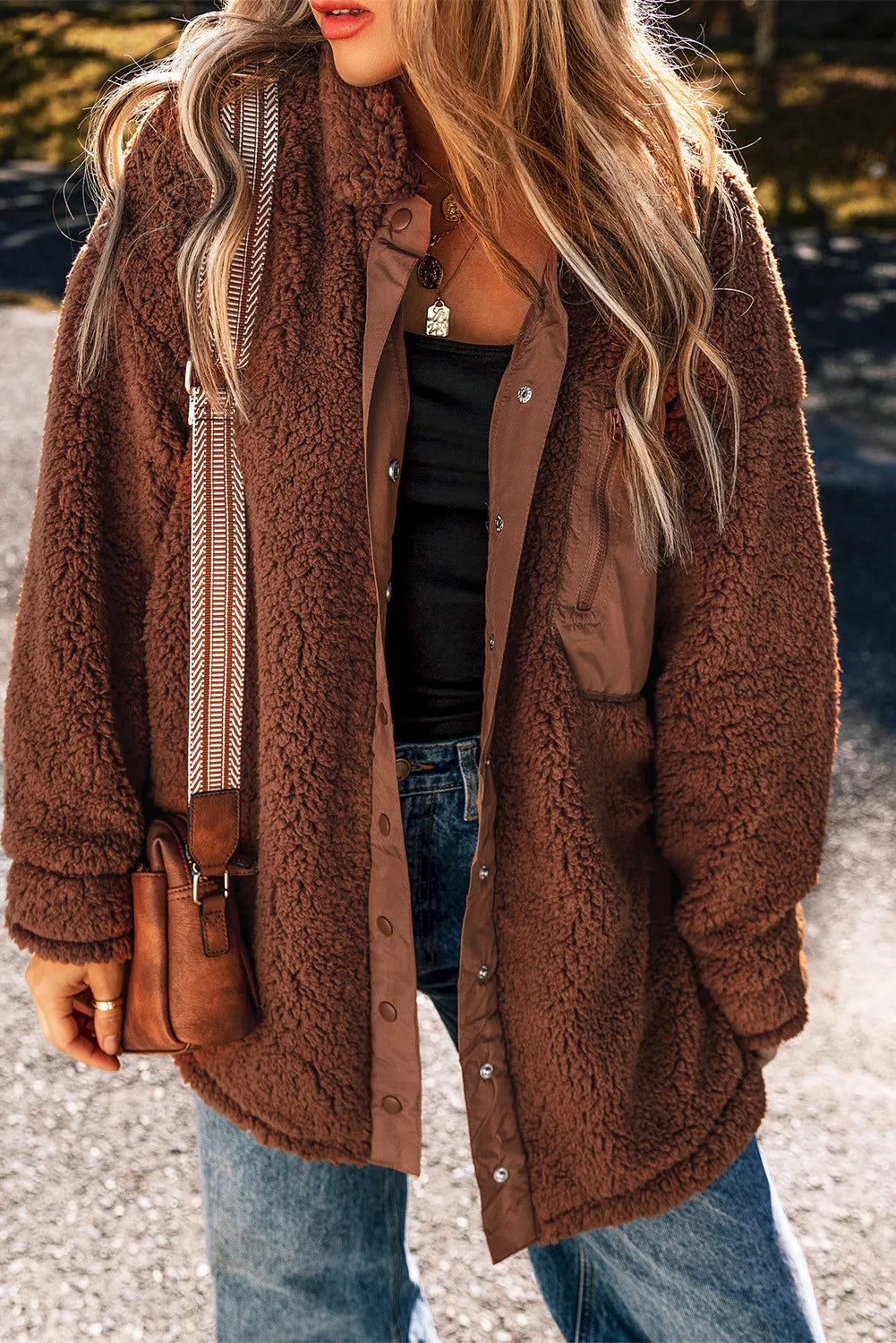 Brown teddy textured utility jacket with button front and chest pocket detail.