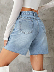 Light blue denim high-waisted Bermuda shorts with frayed hem and button closure.