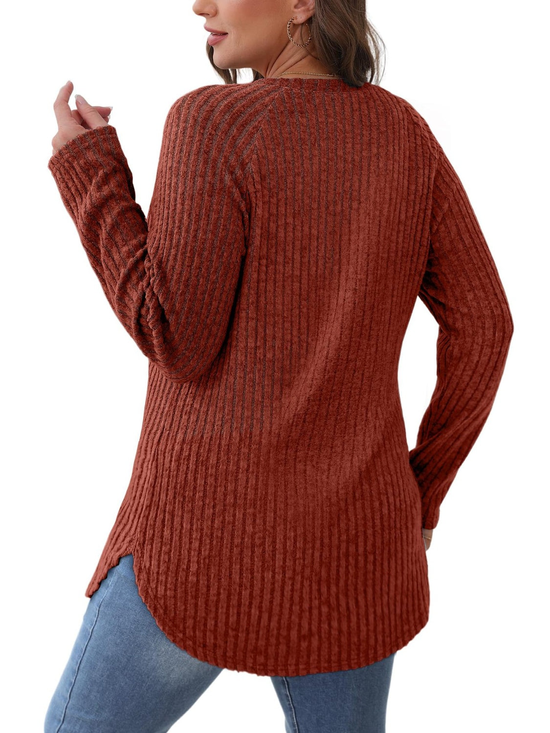 Burgundy ribbed sweater with raglan sleeves and asymmetric hem, casual style.