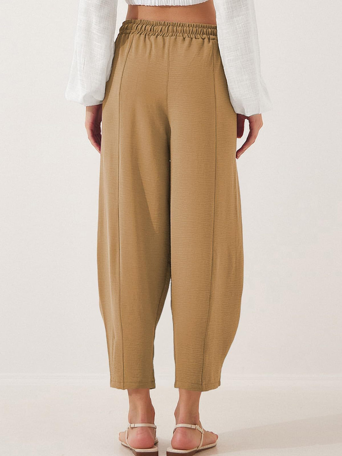 Camel balloon-leg trousers with drawstring waist and seam detail