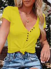 Yellow V-neck buttoned t-shirt with short sleeves and a knotted hem.