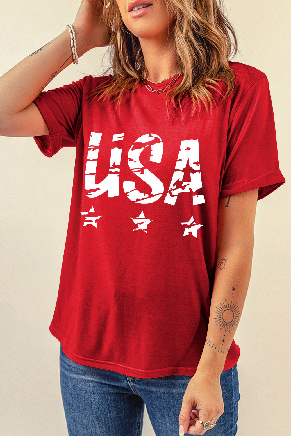 Red USA graphic tee with distressed lettering and stars, short sleeves, comfortable cotton blend.
