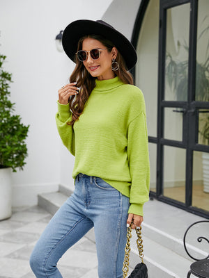 Textured mock neck knit sweater in lime green with long sleeves.