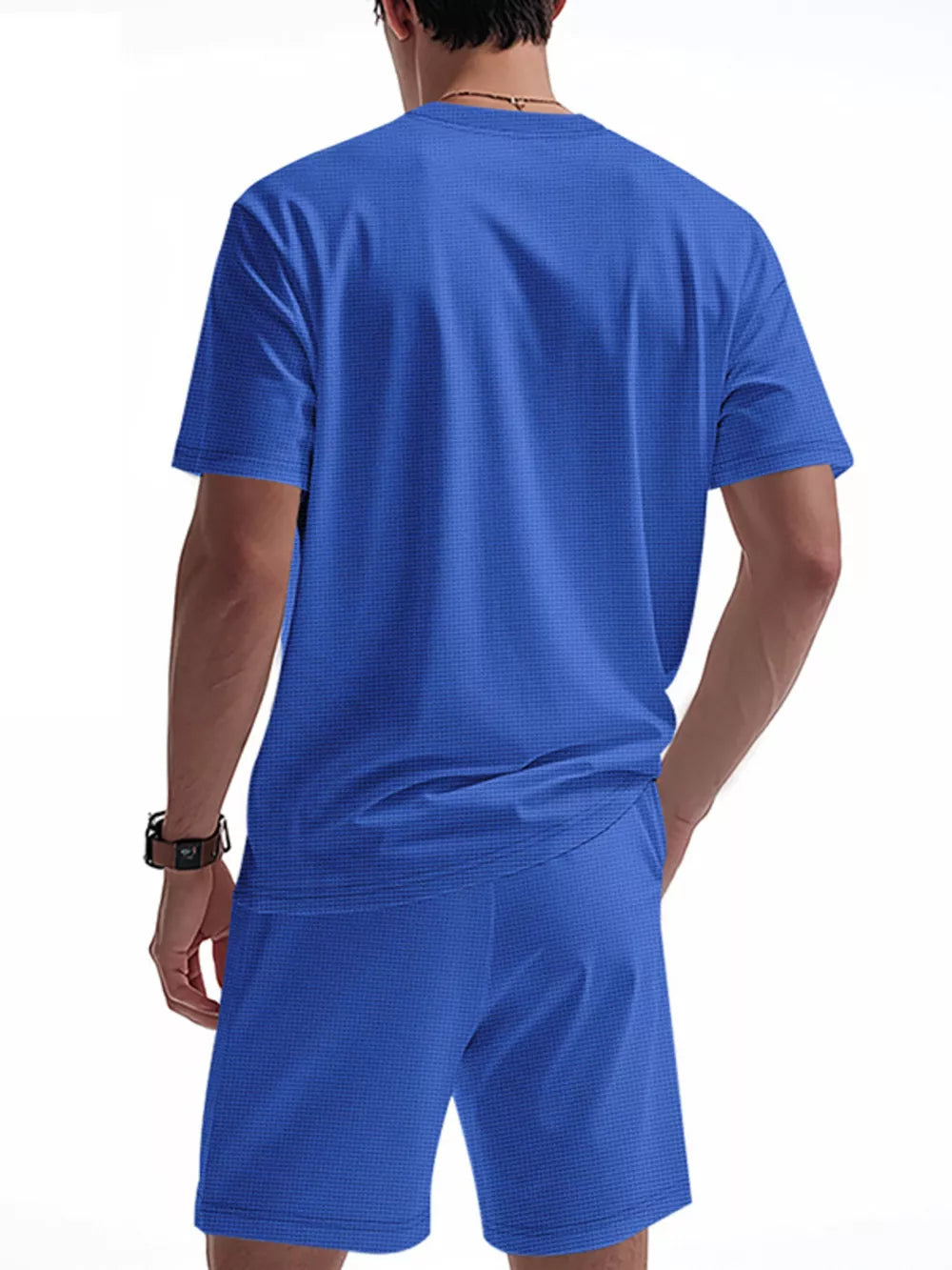 Men's royal blue waffle-knit two-piece pajama set with crew neck t-shirt and shorts.