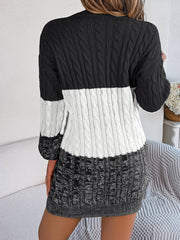 Colorblock cable knit mini dress in black, white, and grey acrylic.