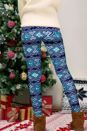 Festive Fair Isle leggings in cerulean blue with snowflake and reindeer pattern.