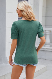 Green tee with gathered short sleeves and gold button detail