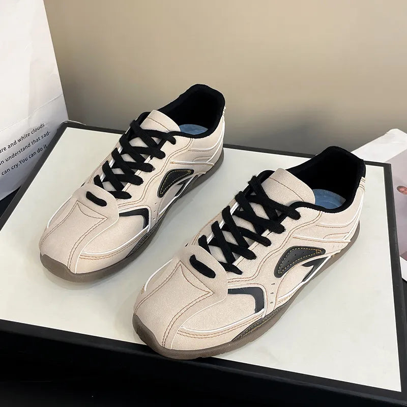 Camel Retro Runner panel sneakers with black laces and accents.