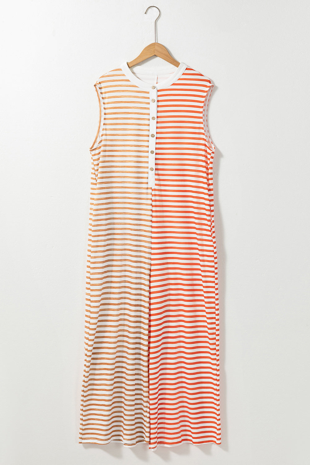 Colorblock stripe sleeveless jumpsuit with button detail and crew neck.