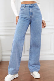 Light blue denim wide-leg jeans with a high rise, shown on a model.