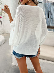 White open-knit dolman sleeve v-neck sweater with batwing sleeves.