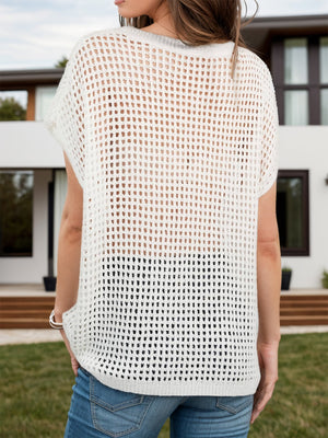 Open-knit boxy top in cream with short sleeves and a relaxed fit.