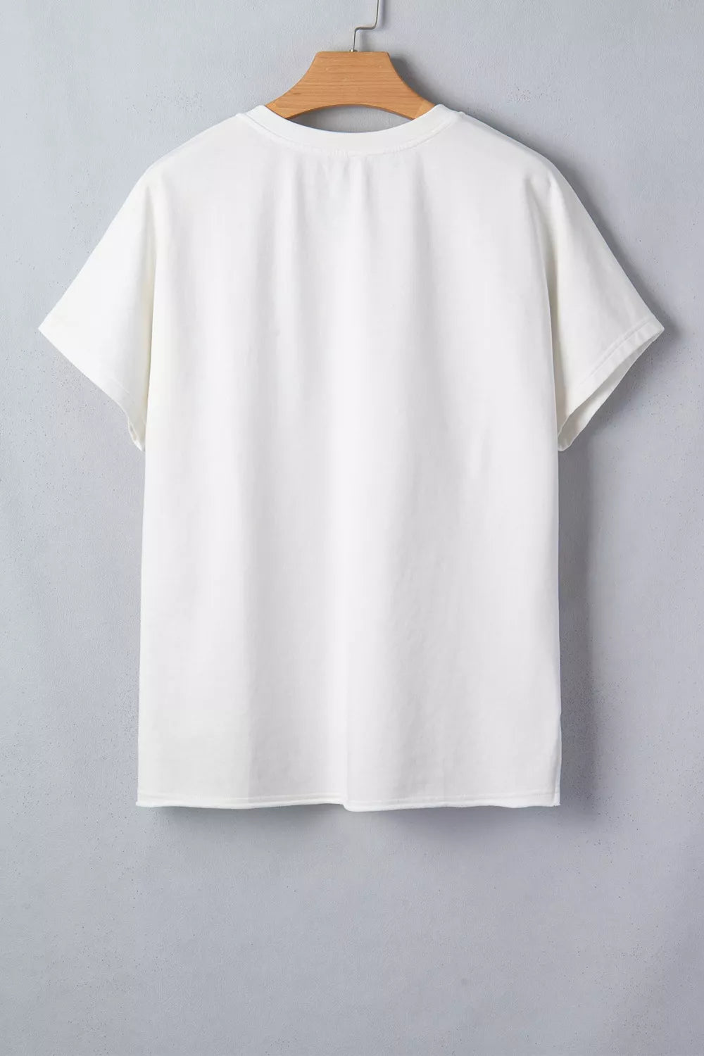 White cotton tee with notched neckline and star applique detail.