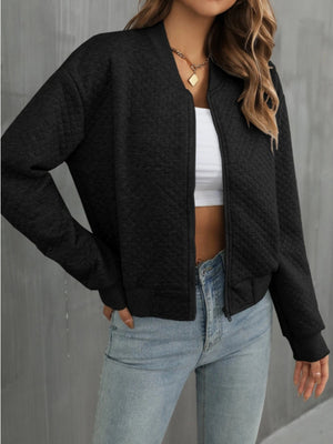 Black diamond quilted bomber jacket with a zip front and crew neck.