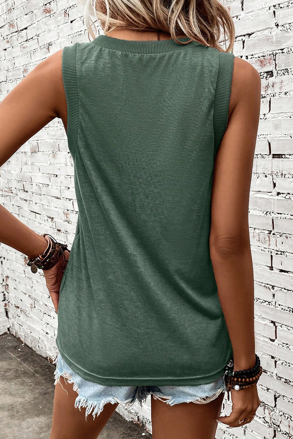 Distressed flag graphic tank top in black forest with ribbed neckline and armholes.