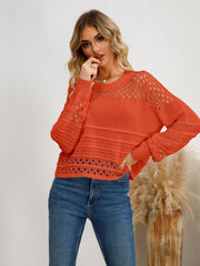 Orange-red openwork knit sweater with crew neck and long sleeves, acrylic.