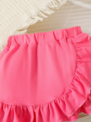 Bright pink ruffle skirt with elastic waist, part of a baby girls' set.