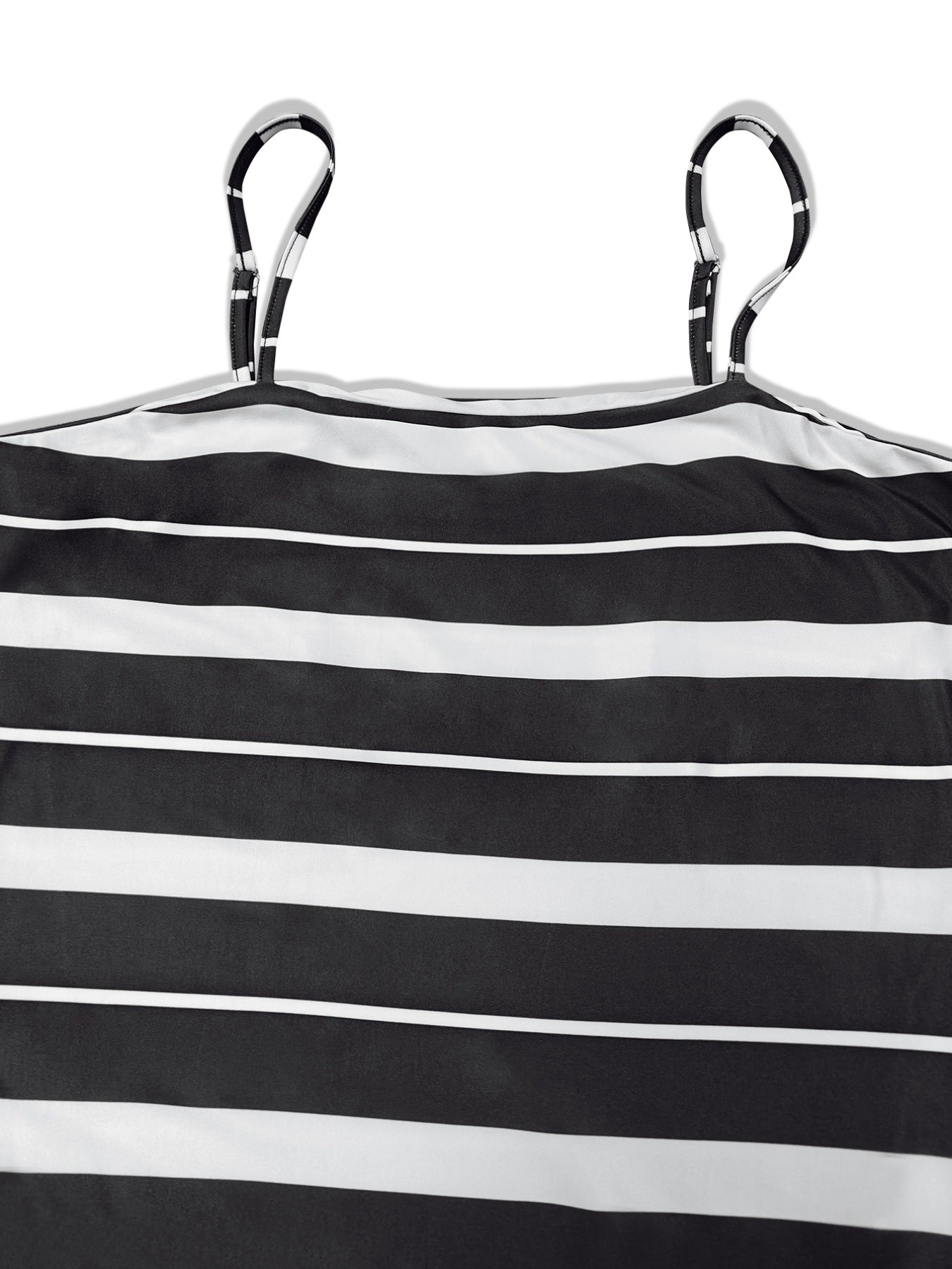 Plus size black and white striped maxi dress with adjustable spaghetti straps.