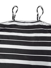 Plus size black and white striped maxi dress with adjustable spaghetti straps.