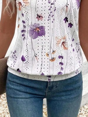Floral V-neck camisole with eyelet detail and purple floral print.