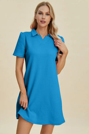Textured blue short sleeve mini dress with V-neck and collar