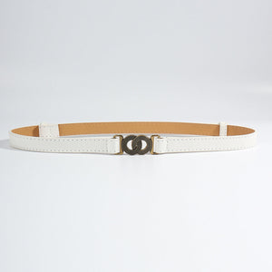 Ivory vegan leather belt with interlocking buckle and bronze hardware.