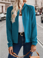 Quilted bomber jacket in French Blue with zip closure and stand-up collar.