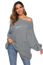 Light gray openwork cocoon sleeve knit sweater with boat neck and relaxed fit.