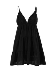 Black cotton tiered mini dress with lace trim V-neck and spaghetti straps.