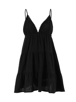 Black cotton tiered mini dress with lace trim V-neck and spaghetti straps.