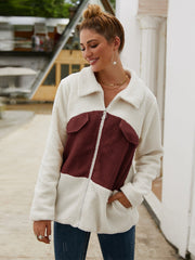 Colorblock shearling zip-up jacket with burgundy pockets and collar, featuring a relaxed fit.