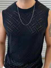 Black geometric knit sleeveless sweater with a crew neck.