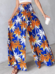 Bohemian print wide leg pants in Royal Blue with smocked waist and palm tree pattern