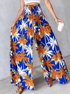 Bohemian print wide leg pants in Royal Blue with smocked waist and palm tree pattern